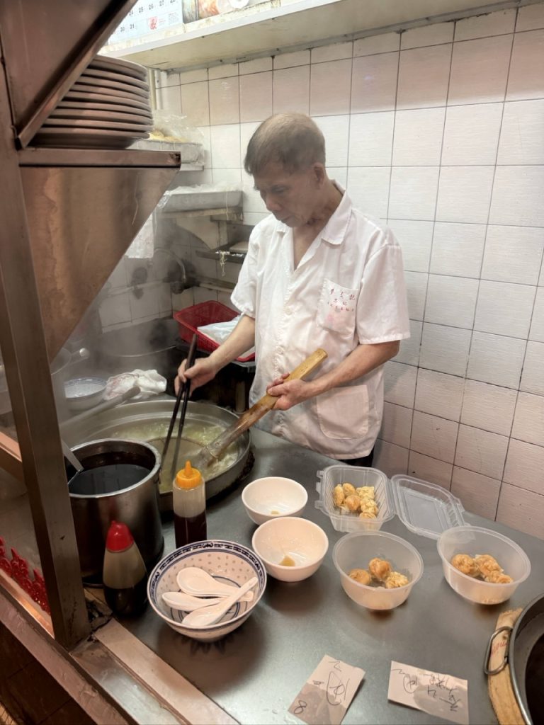 Wonton noodles being prepared at a traditional Hong Kong noodle shop