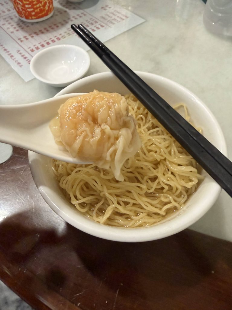 Traditional Hong Kong wonton noodles with shrimp wonton in clear broth